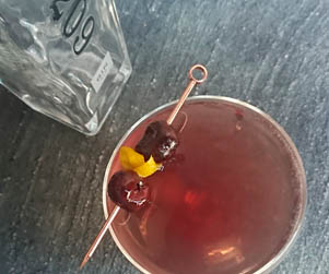 Aviation Cocktail with saffron cherry syrup
